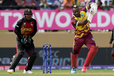 Andre Russell plays a shot  against PNG
